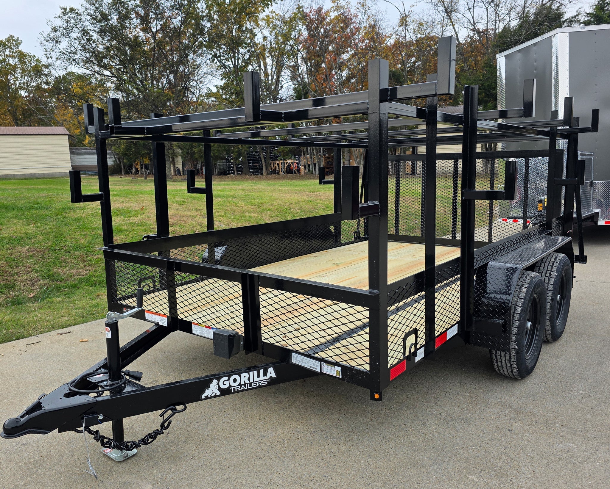 20251107_121253 7x12 Straight Deck Utility Trailer 4ft Ladder Racks with 1.5 FT Mesh (2) 3500lb Axle - Image 1