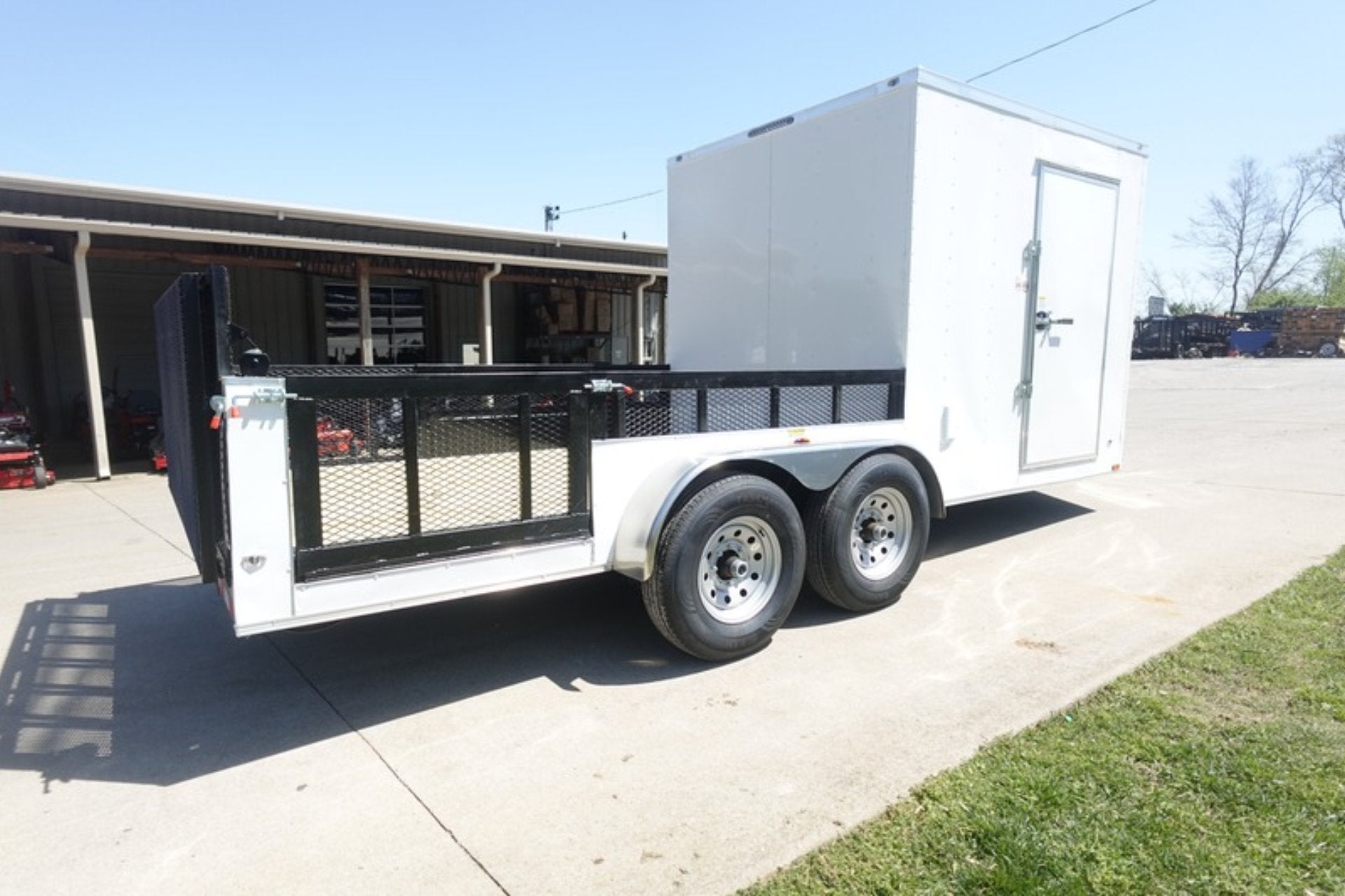 DSC03506 7x18 White Hybrid Enclosed V Nose (2) 7K Axles 2 Ft Fold Down Mesh Sides Pintle Hitch - Image 1